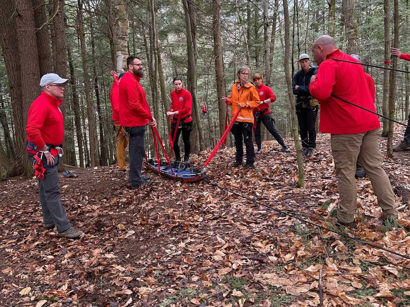 KSAR members rig a rescue litter with haul lines during training